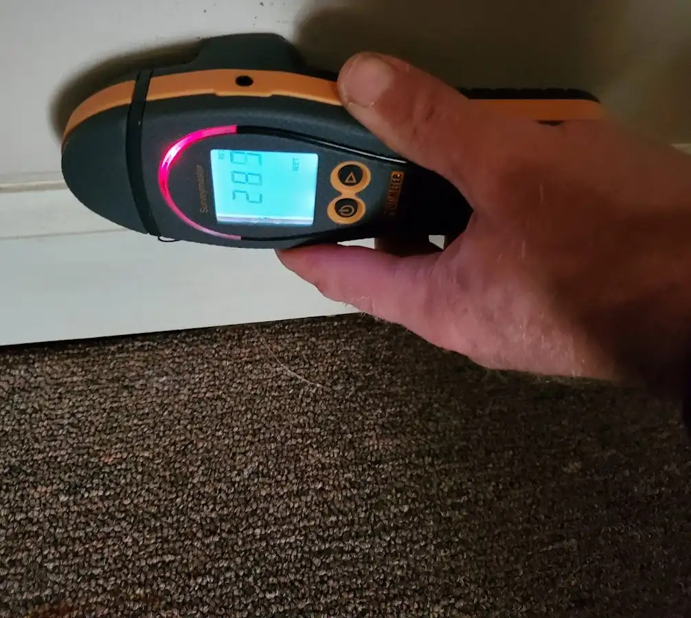 Moisture detection at baseboard during Storm Damage Restoration in Lenoir City